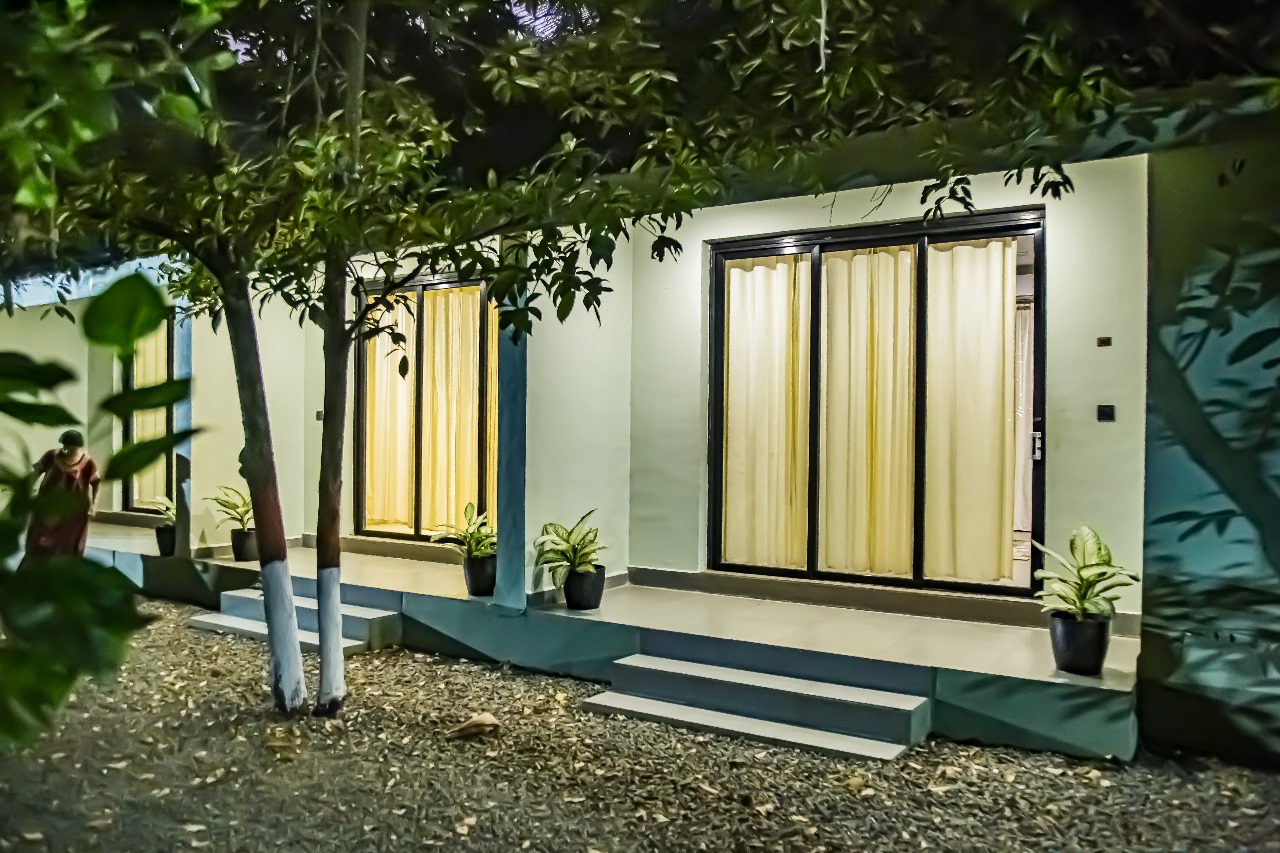 Cottage 2 (Room 102) — Standalone Cottage Exterior & Verandah at Night